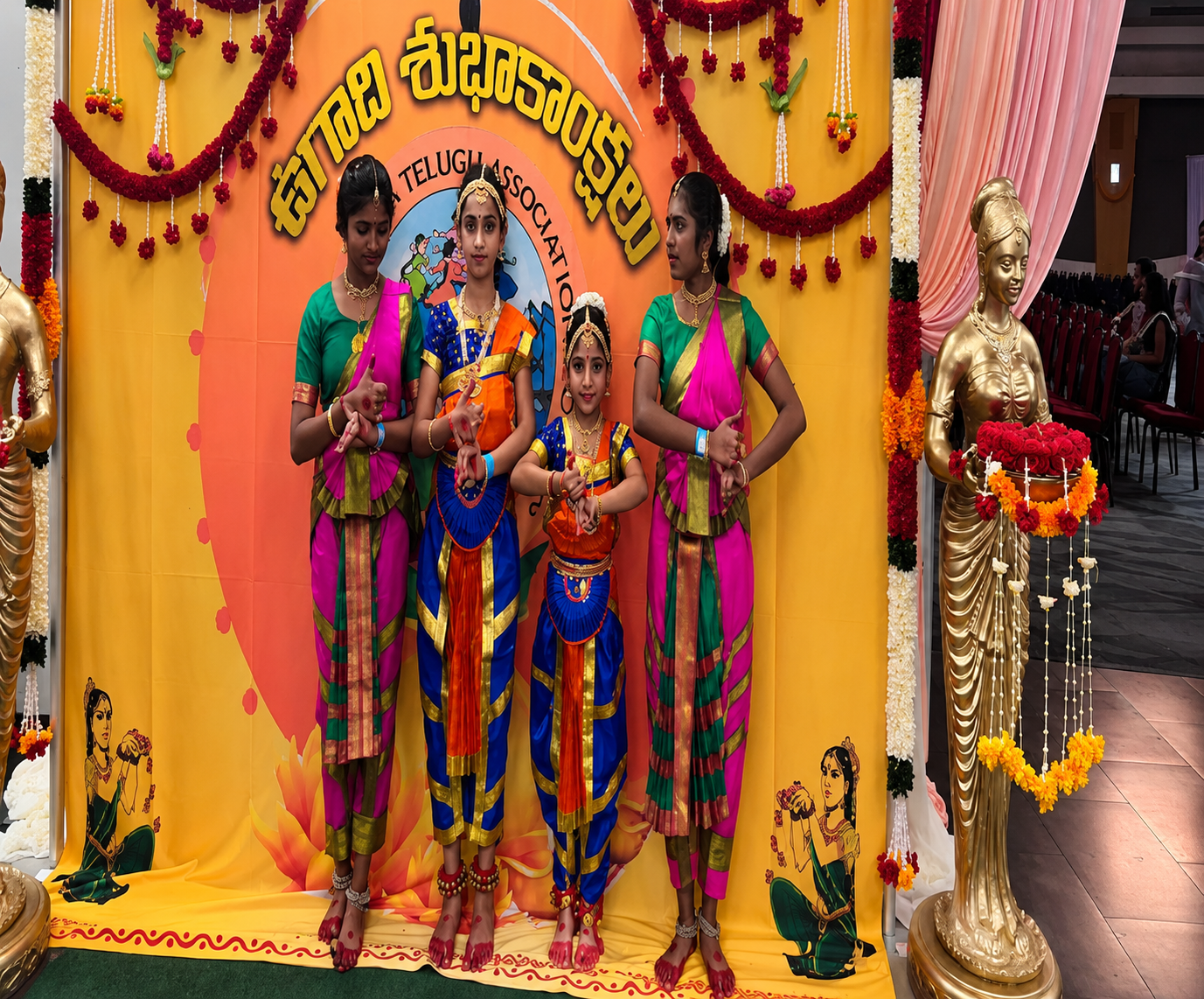 Group Bharatanatyam performance at a cultural event